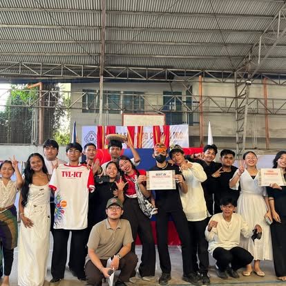TVL-ICT students pose with certificates after a campus programme.